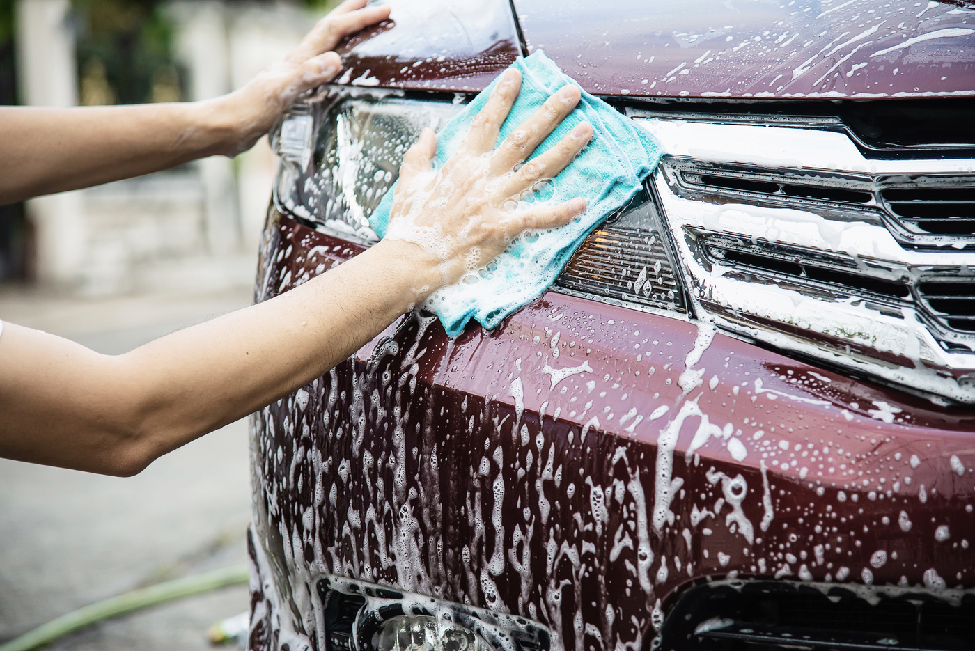 Man Washing Vehicle