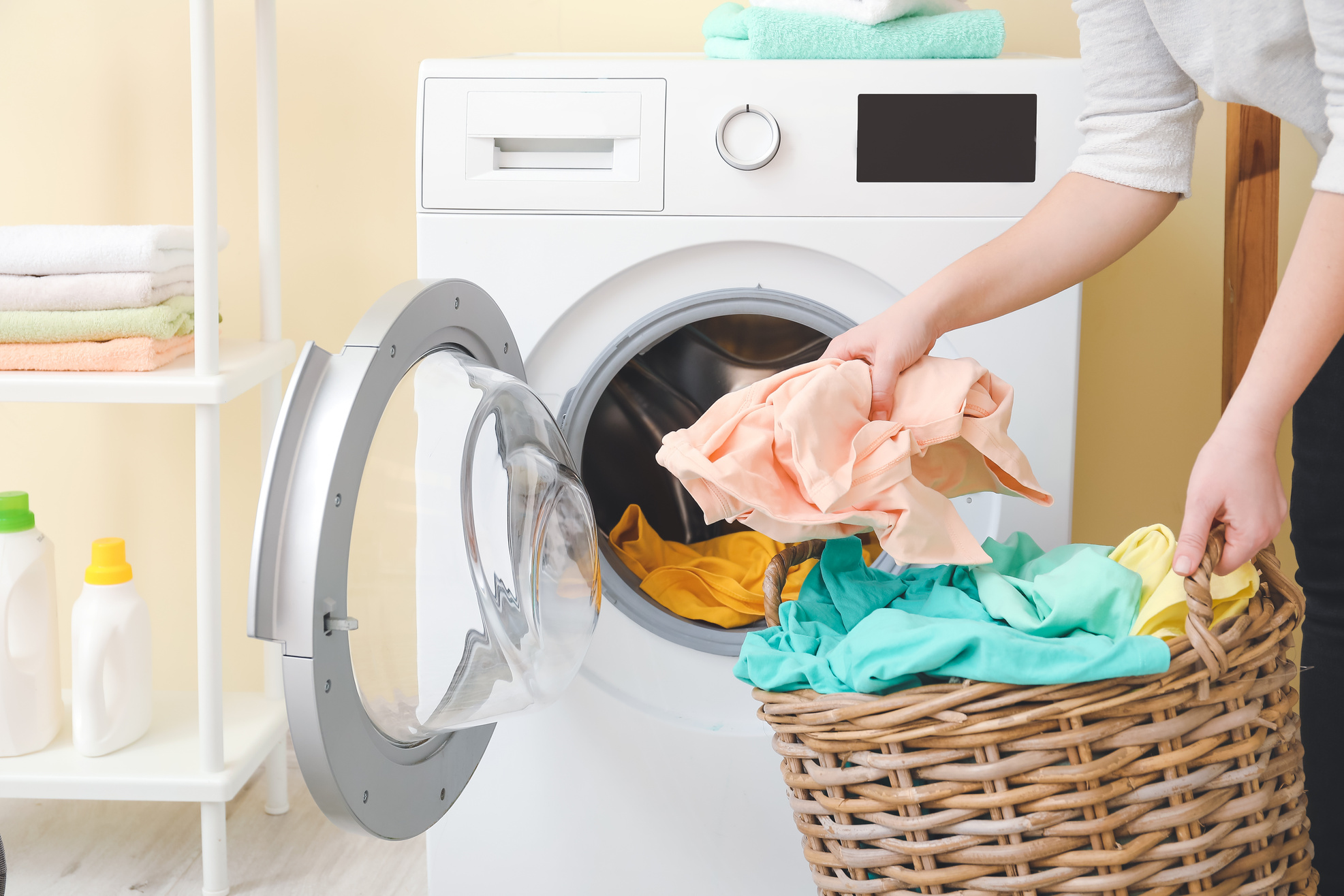 Young Woman Doing Laundry at Home