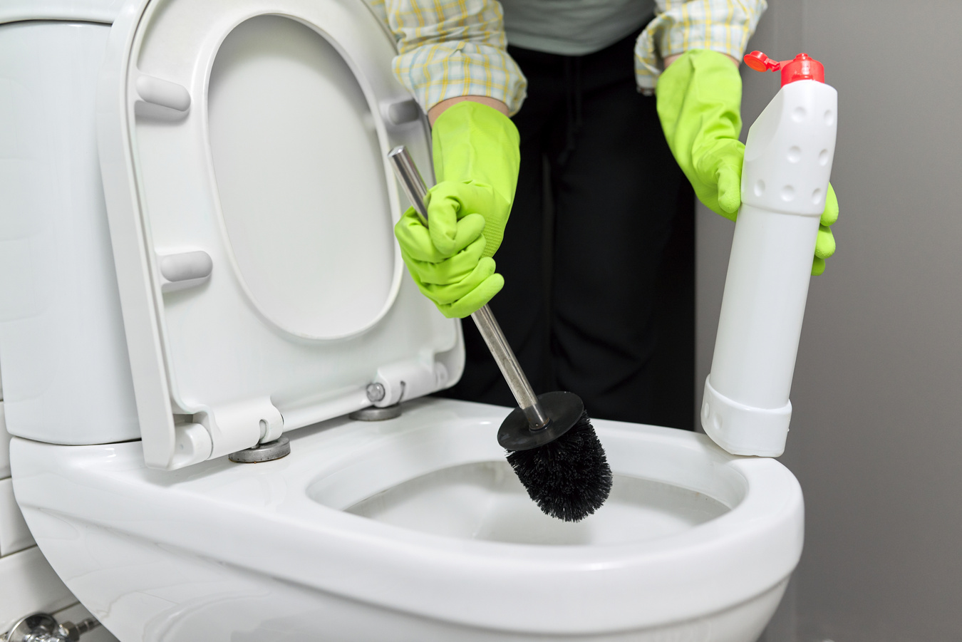 Cleaning the Toilet with Bathroom Scrub and Liquid Toilet Cleaner